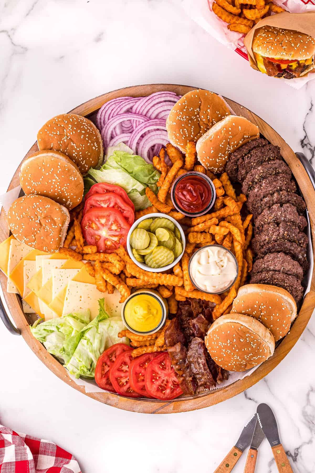 Overhead image of a hamburger board with toppings