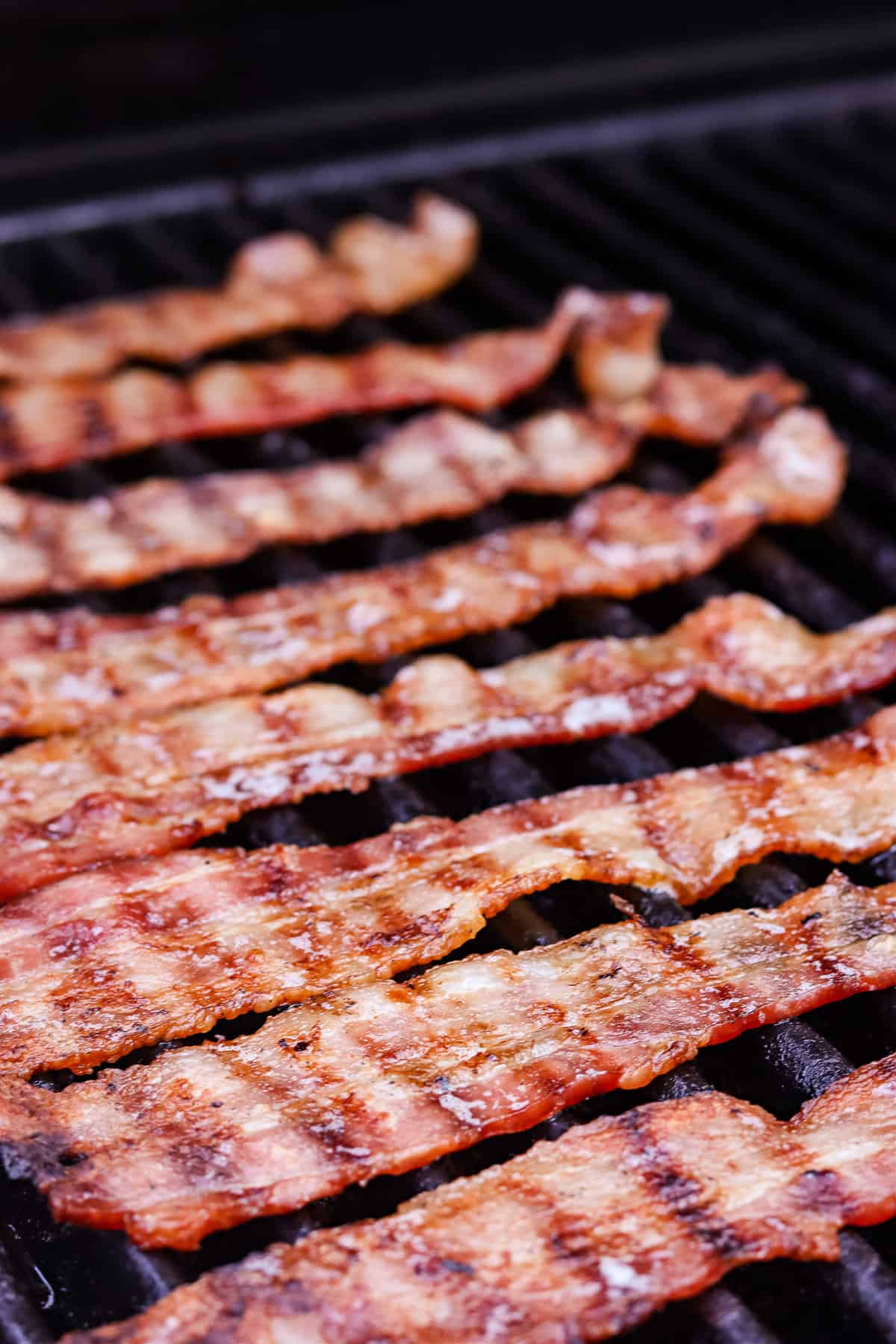 Cooked bacon on grill
