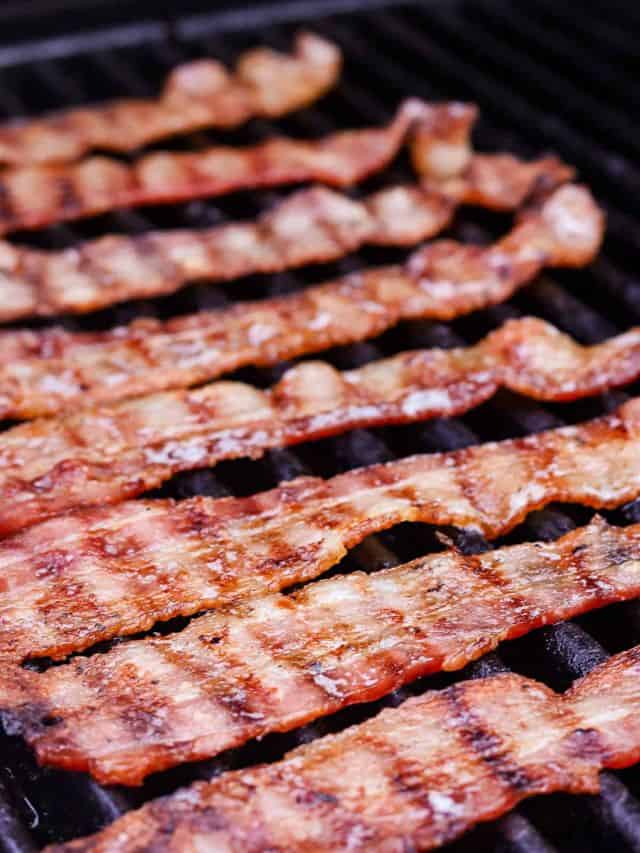 Grilled Bacon on top of grill gates
