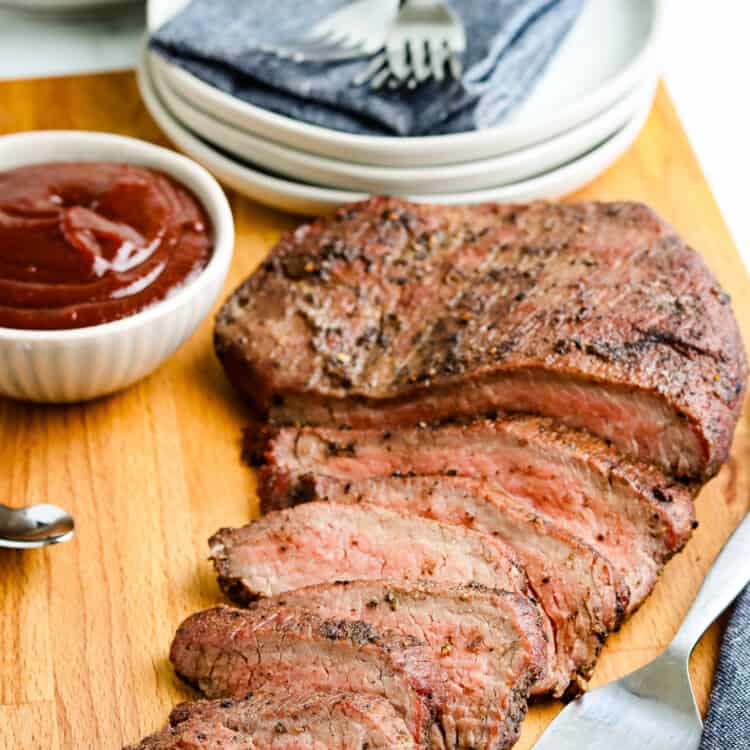 Sliced tri tip sliced on cutting board