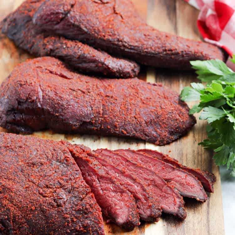 Smoked Venison Roast Recipe Sliced on Cutting Board