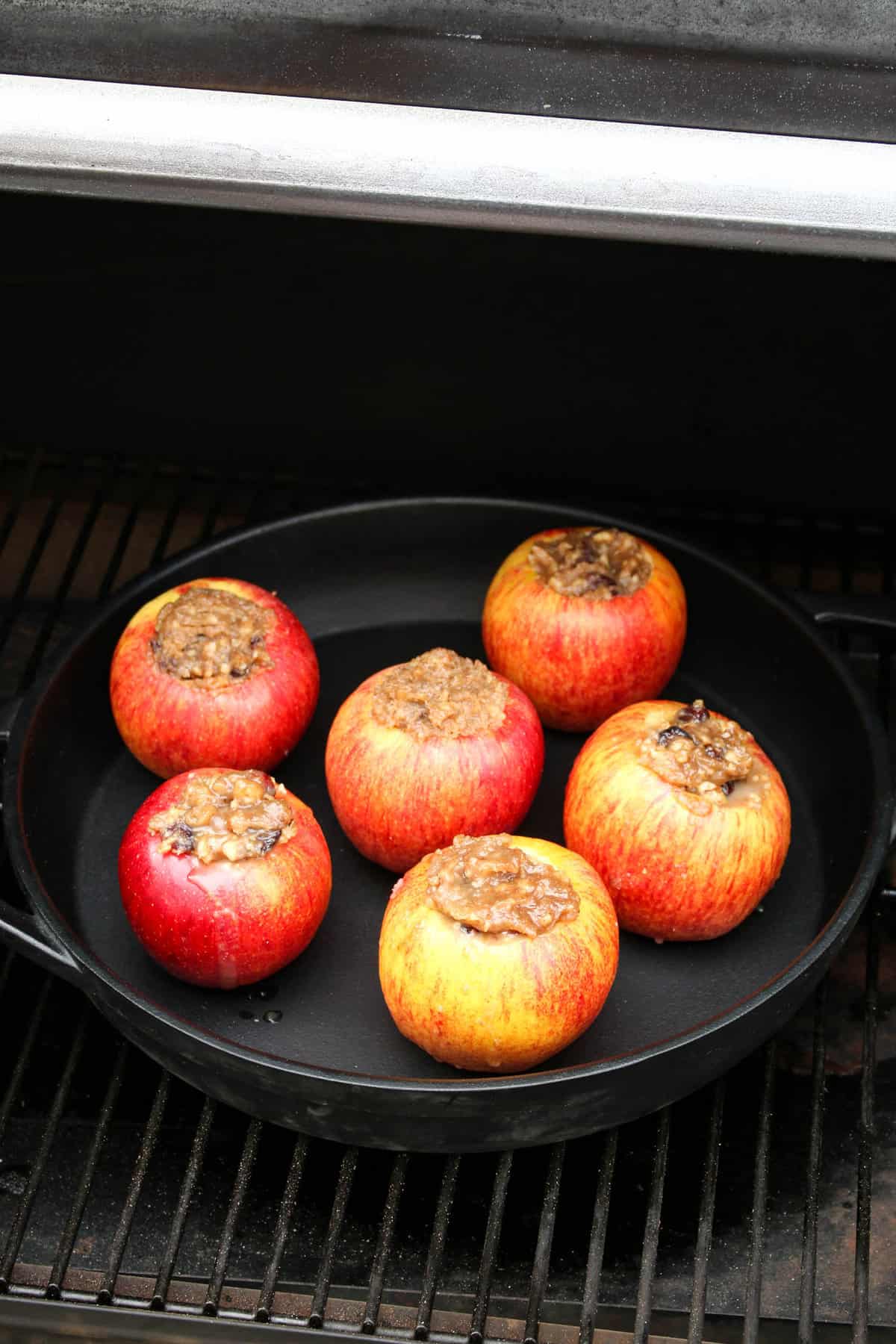 Smoked Apple Recipe for the Traeger Grill Arranged in Cast Iron Skillet