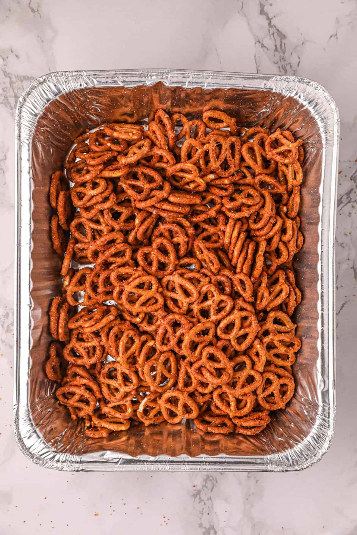 Pretzels Coated in Butter and Rub Ready for the Smoker for Traeger Smoked Pretzels