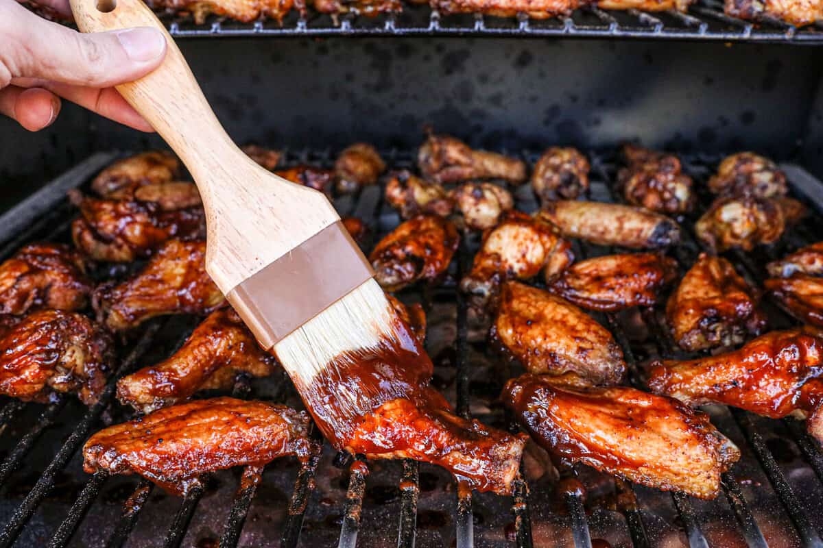 Brusing on BBQ Sauce on Smoked Chicken Wings