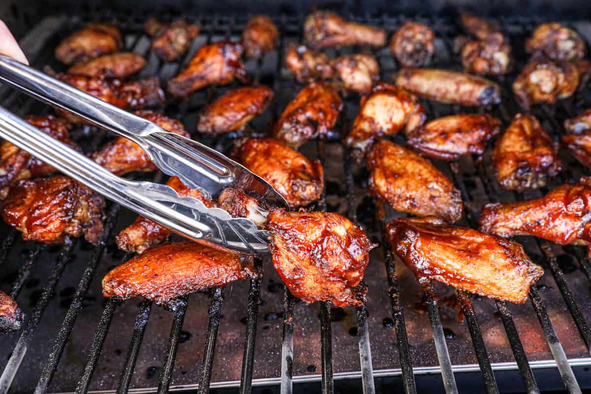 Using Tongs for Smoked Chicken Wings