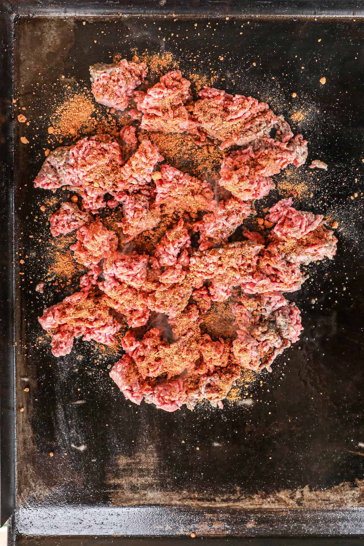 Ground Beef and Taco Seasoning on Blackstone for Crunchwrap Recipe