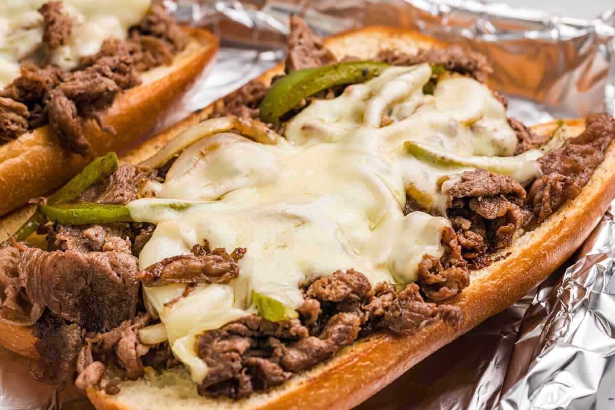 https://gimmesomegrilling.com/wp-content/uploads/2023/07/Philly-Cheesesteak-on-the-Blackstone-1-of-2.jpg