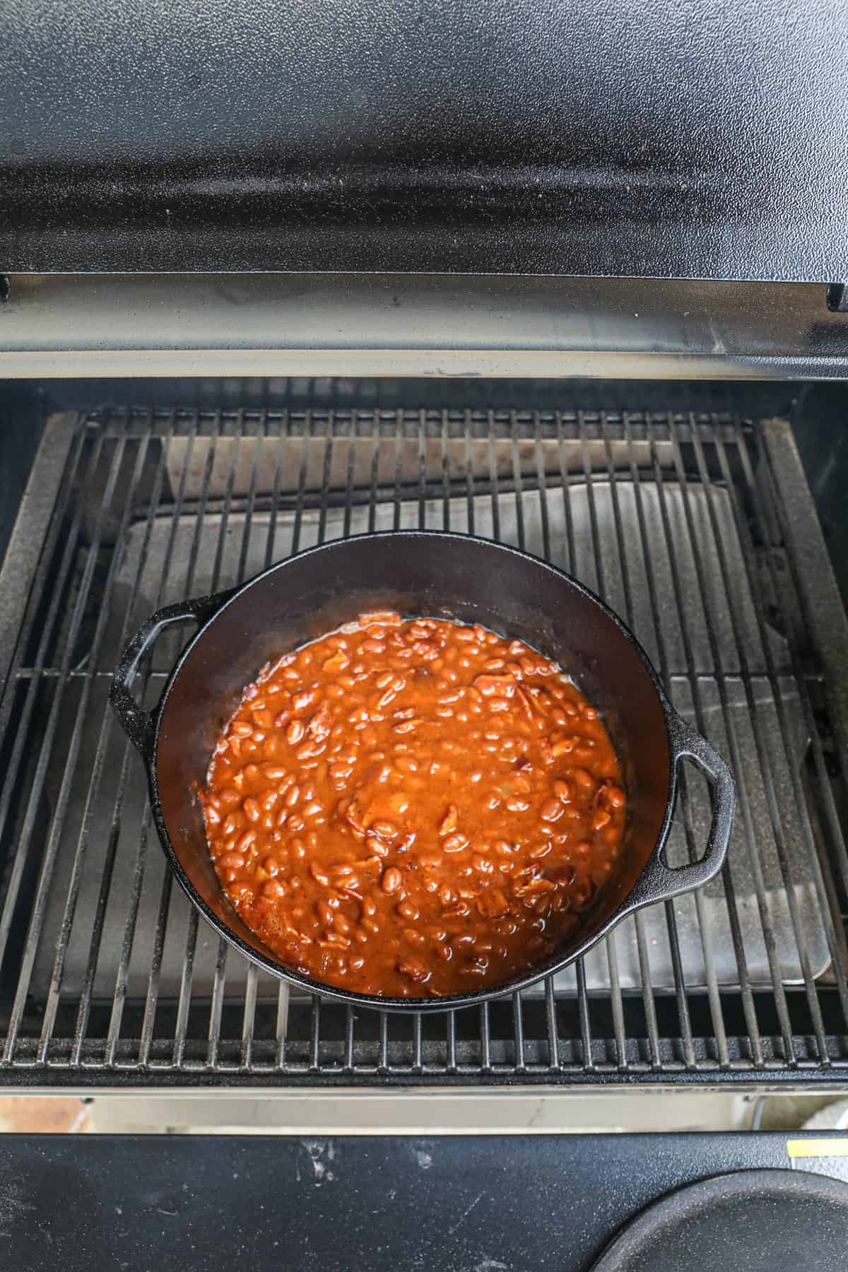 Smoked Baked Beans in a dutch oven in the smoker