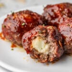 Smoked Stuffed Meatballs on White Plate
