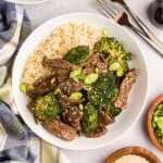 Blackstone Beef & Broccoli atop white rice in shallow bowl