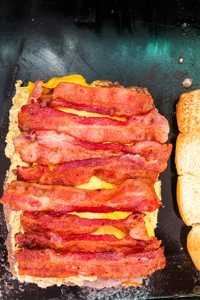Adding a bacon layer to the Blackstone Breakfast Sliders 