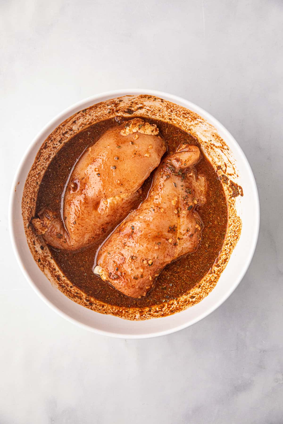 Chicken breasts in marinade sauce for Chicken Street Tacos recipe