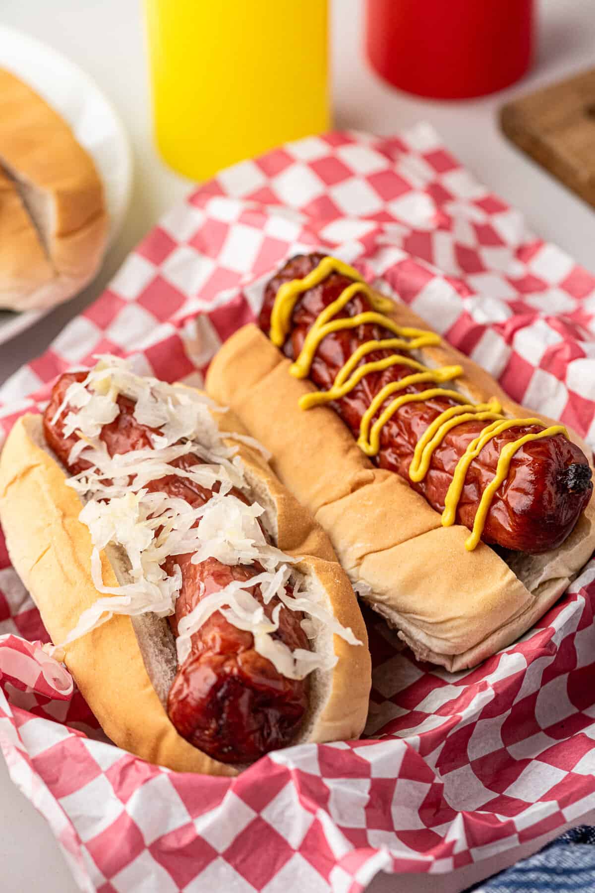 Smoked Sausage loaded with all of the fixings in a buns