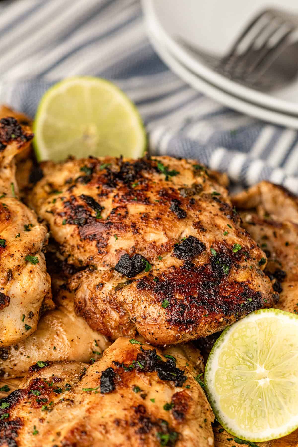 Chicken Asado with fresh lemon and lime slices