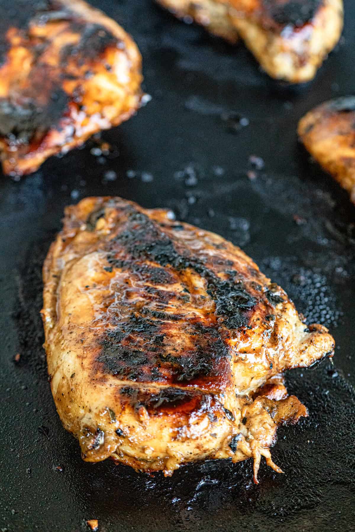 Cooking chicken breasts in Chicken Marinade on Blackstone griddle