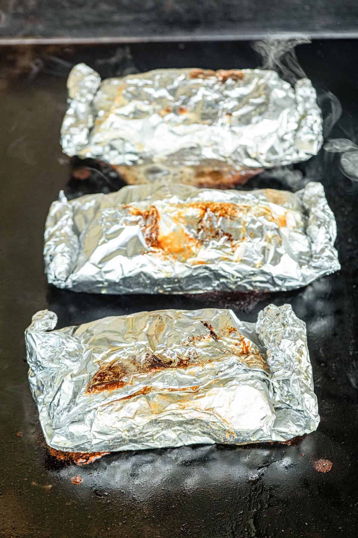 Grilling Crack Chicken Foil Packets on Blackstone Griddle