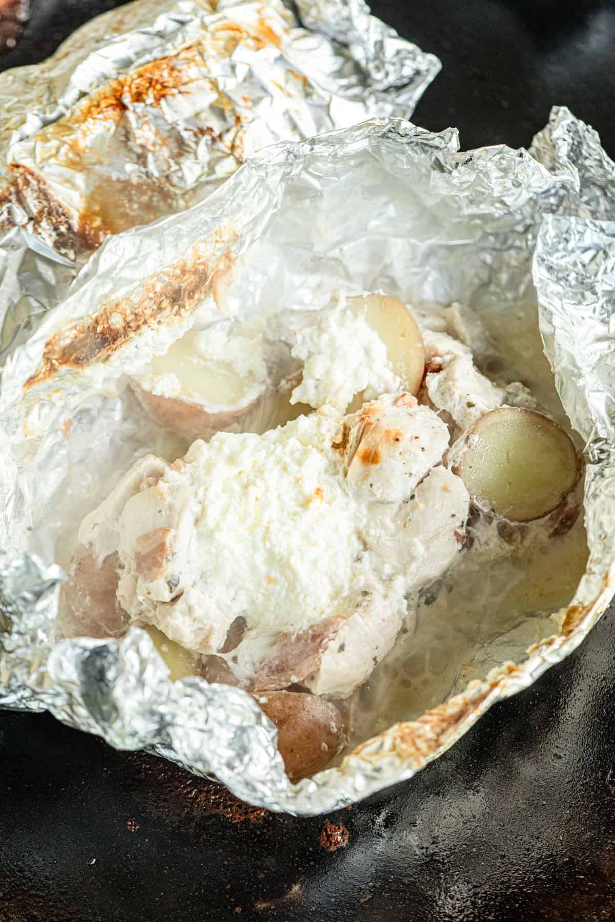Opening Crack Chicken Foil Packet before adding shredded cheese