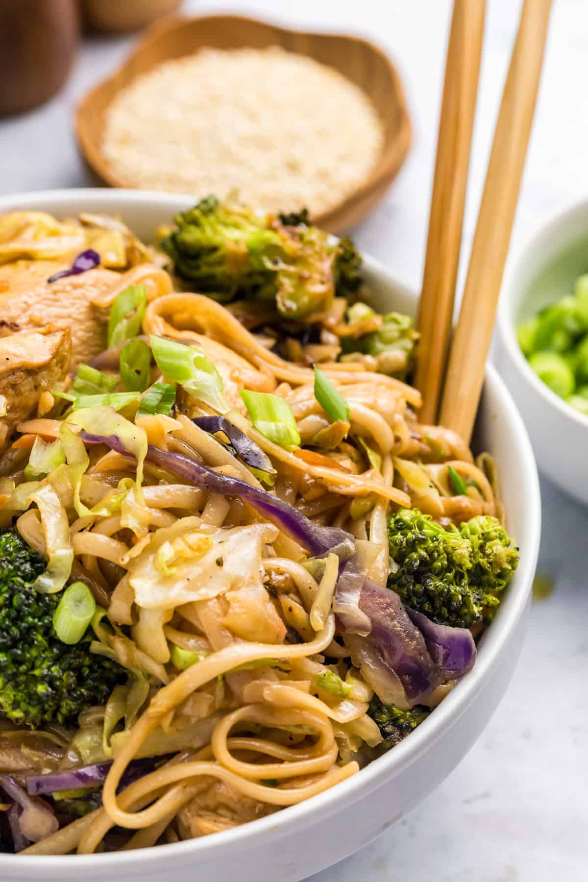 Blackstone Chicken Stir Fry in serving bowl with chopsticks
