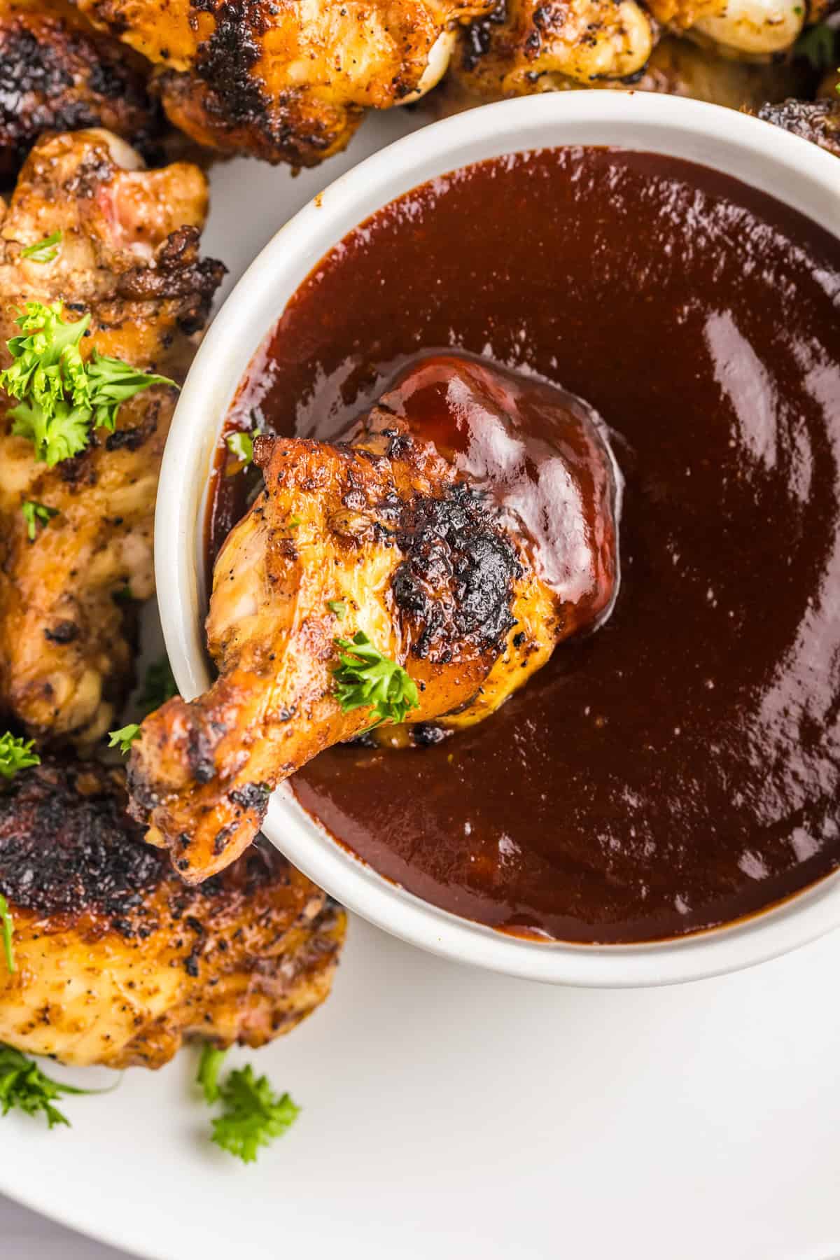 Bowl of BBQ dipping sauce for Blackstone Chicken Wings 