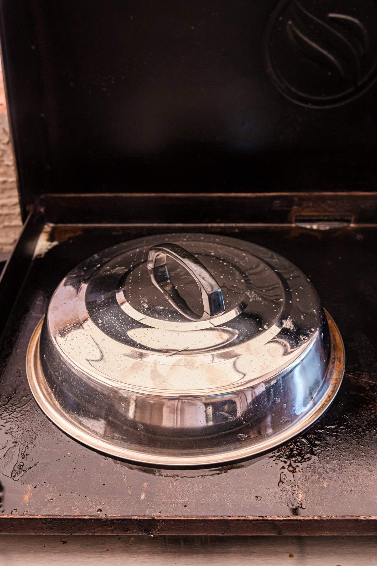 Using cooking dome to steam pierogies for Pierogies on Blackstone griddle for Blackstone Sausage and Pierogies recipe 