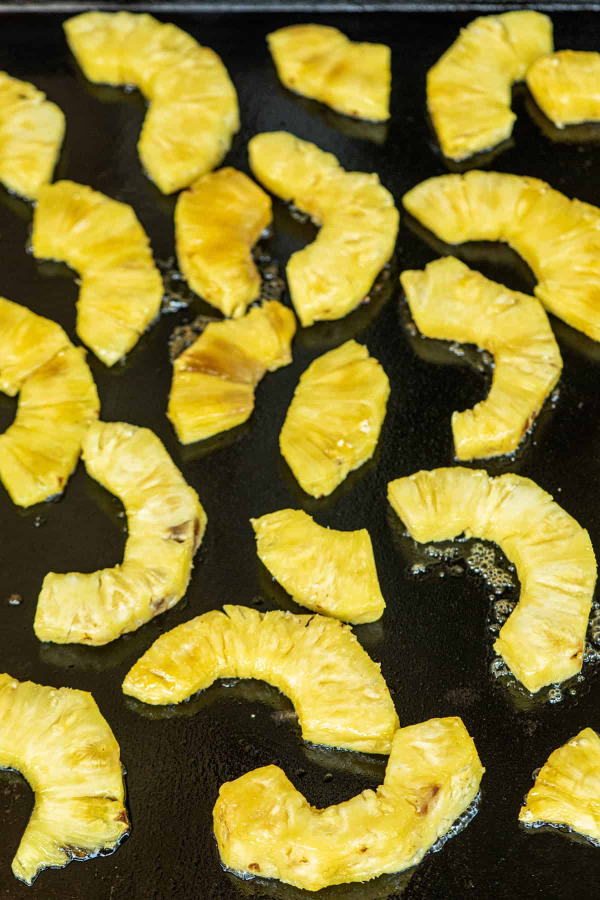 Grilled Pineapple pieces on grill