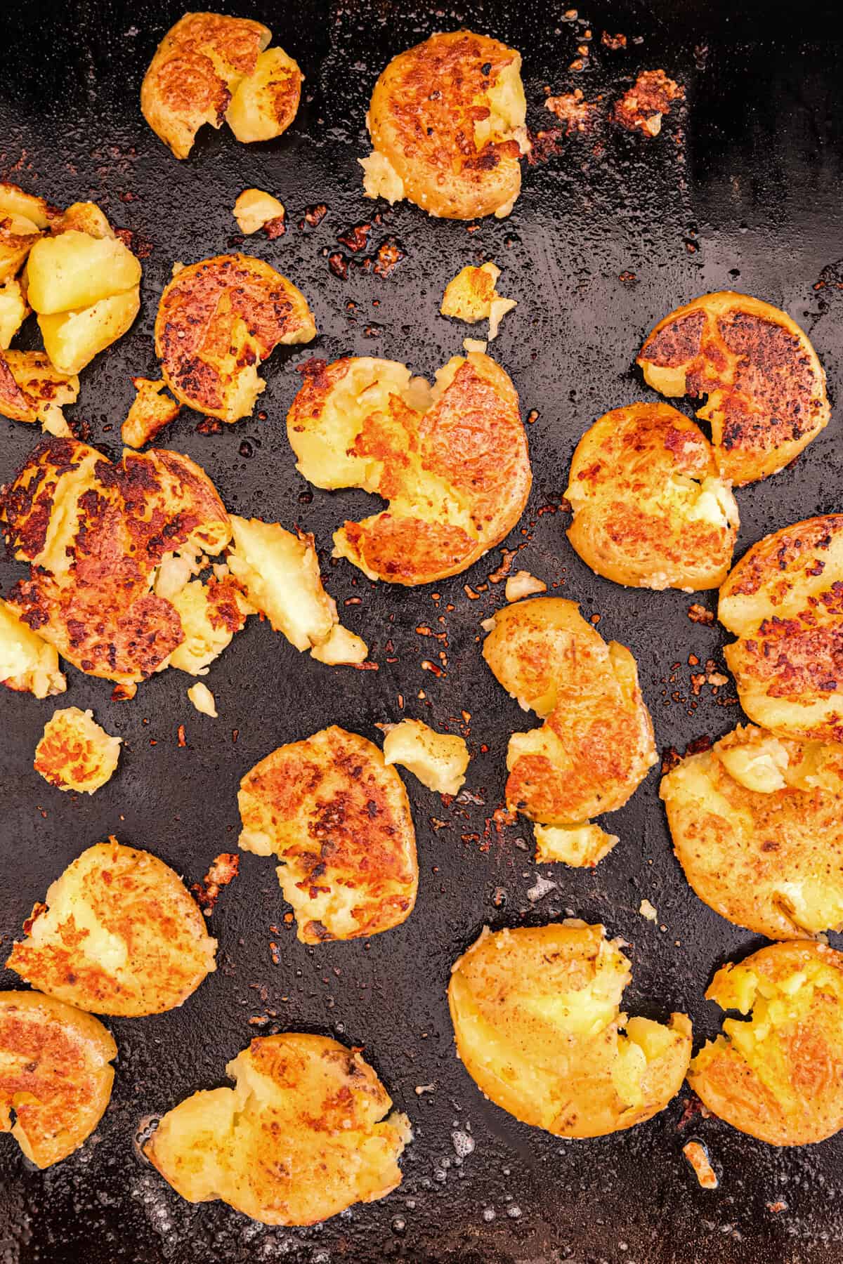 Smashed and browned seasoned potatoes for Blackstone Loaded Smashed Potatoes recipe