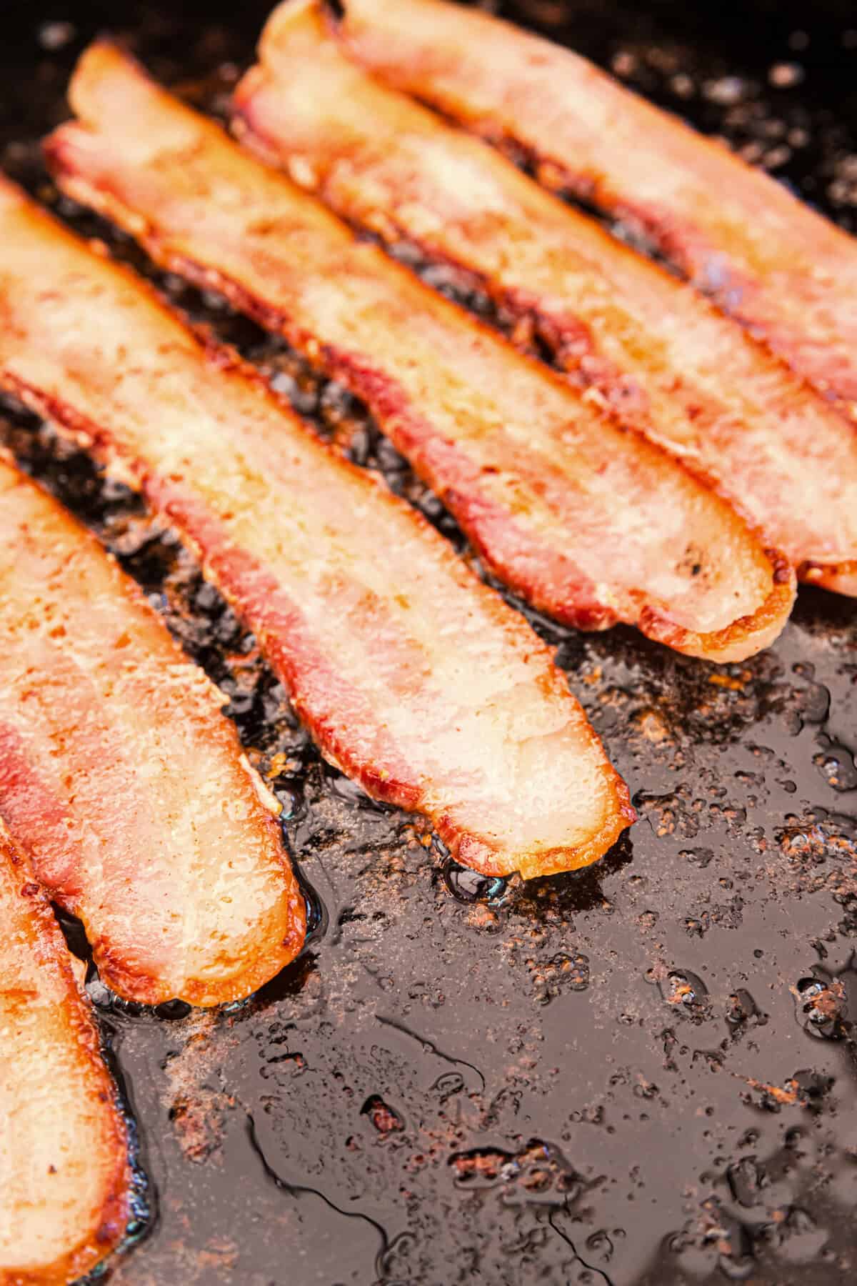 Bacon cooking on the Blackstone.