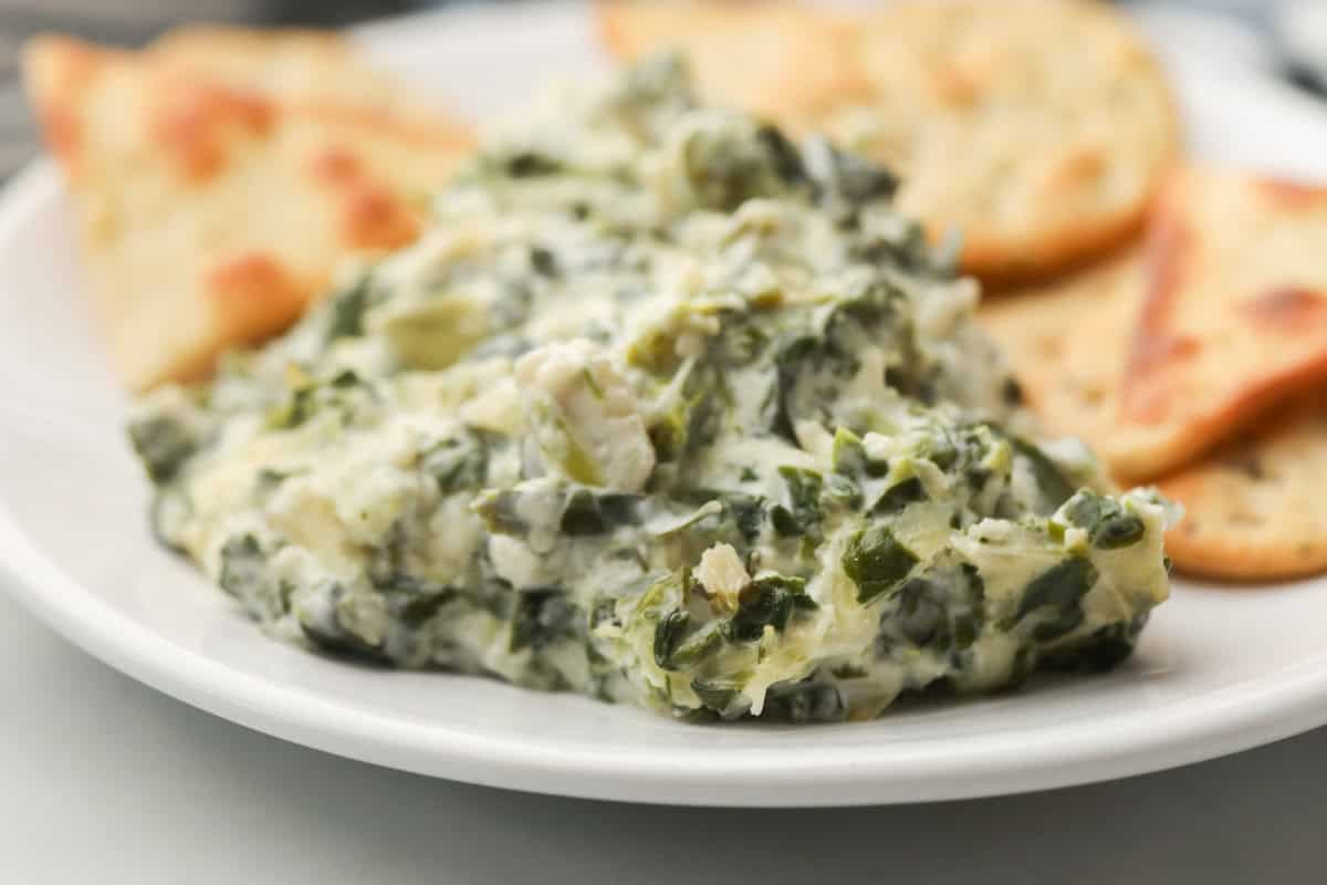Landscape view of completed Smoked Spinach Artichoke Dip.