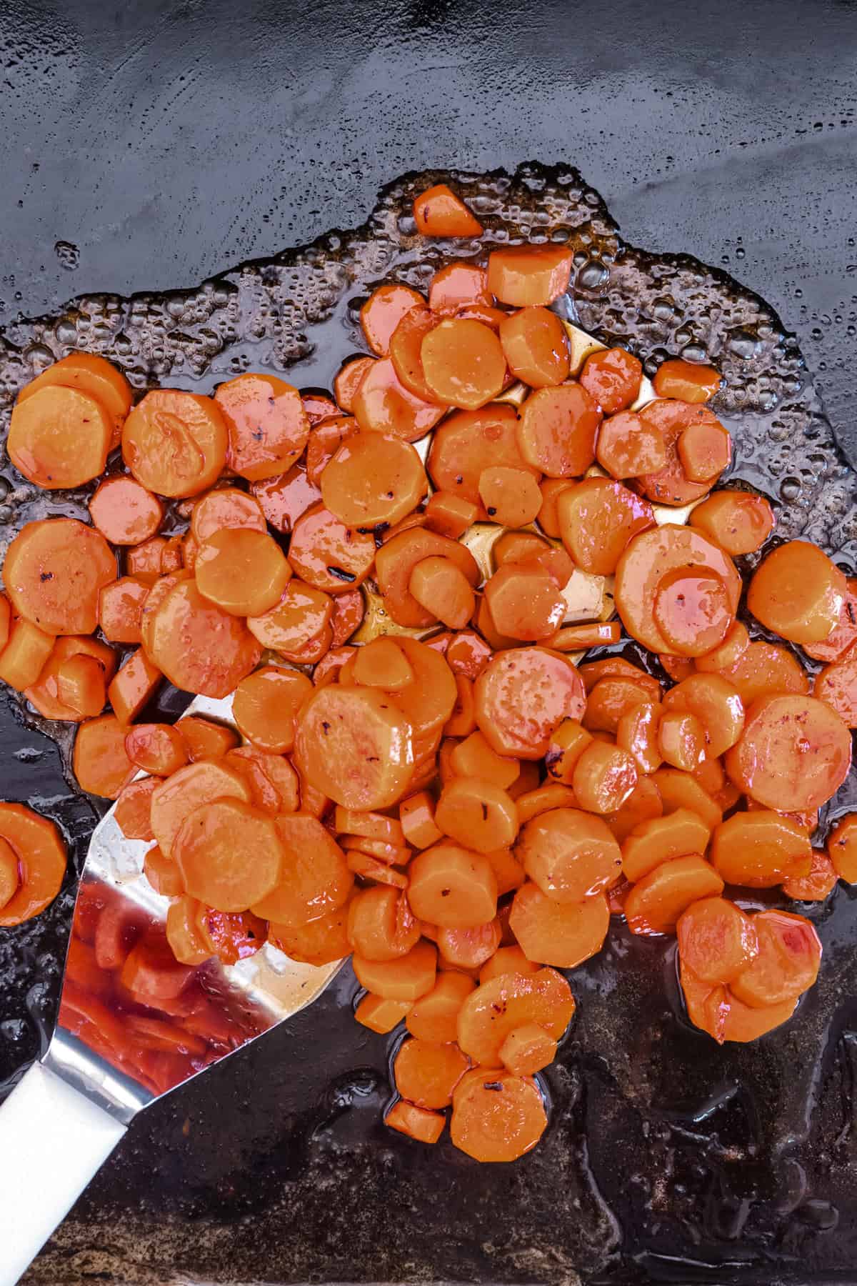 Overhead picture of completed Blackstone Glazed Carrots on the Blackstone.