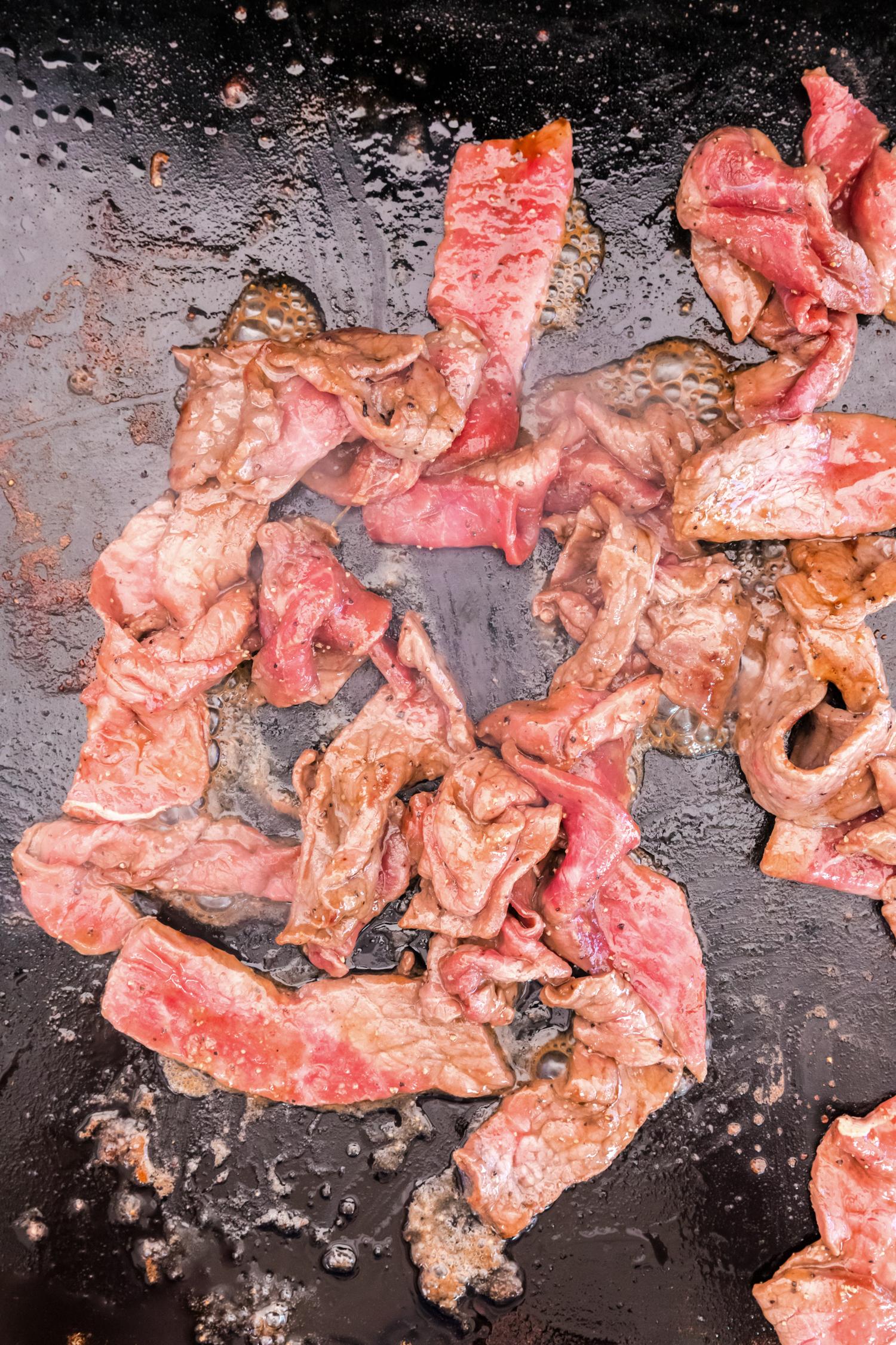 Picture of cooked steak on the blackstone.