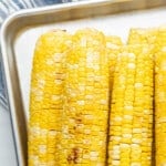 Smoked Corn on the Cob Square Image of corn arranged on baking sheet
