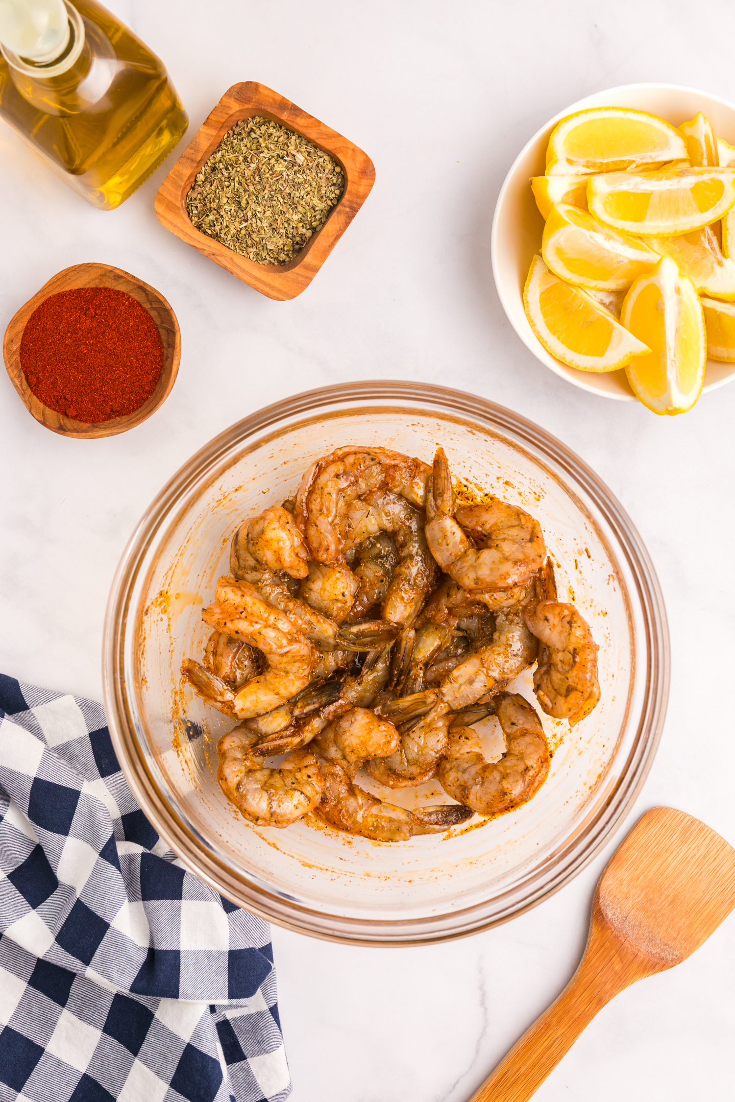 Shrimp fully coated in the marinade, evenly seasoned and ready for grilling.