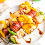 Chicken and Sausage Kebabs on white plate