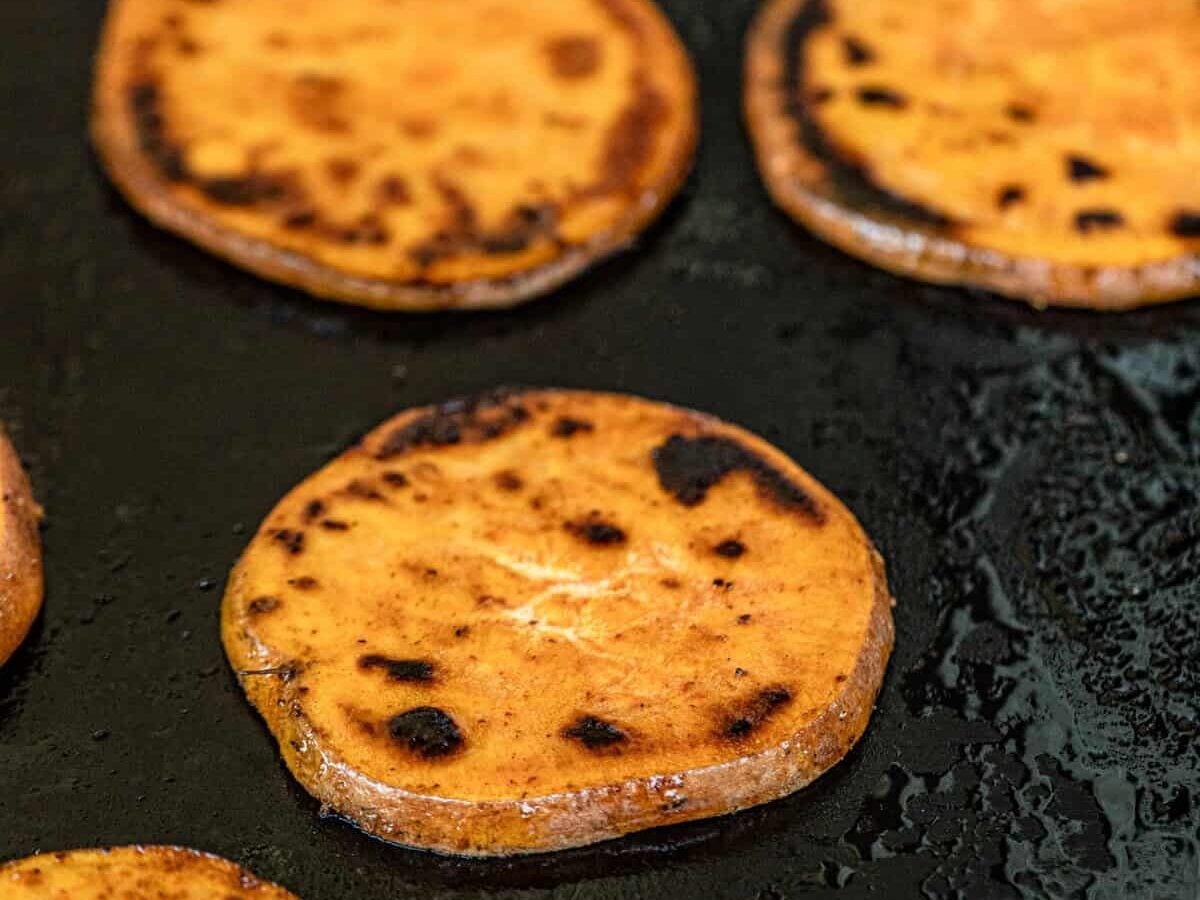 Grilled Sweet Potatoes browned to perfection on the gril
