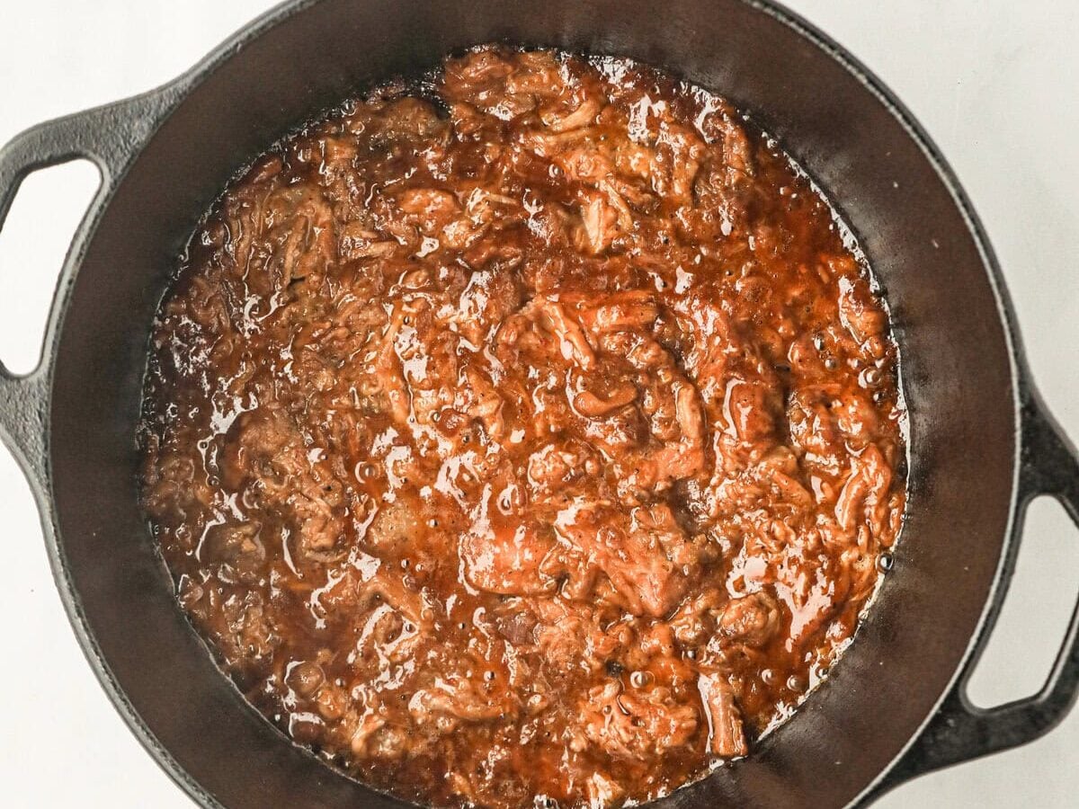 Leftover pulled pork in large pot for Pulled Pork Chili recipe