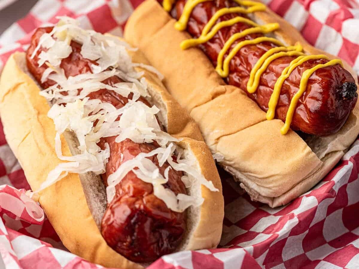 Smoked Sausage loaded with all of the fixings in a buns